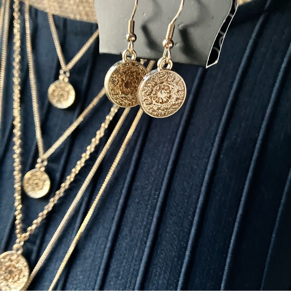 Gold medallion layered necklace and earrings